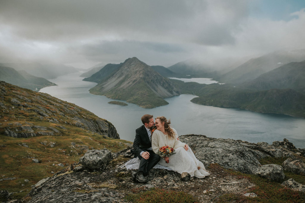 Fall elopement on a mountain top in Alta Norway captured by Norway elopement photographer TS Foto Design