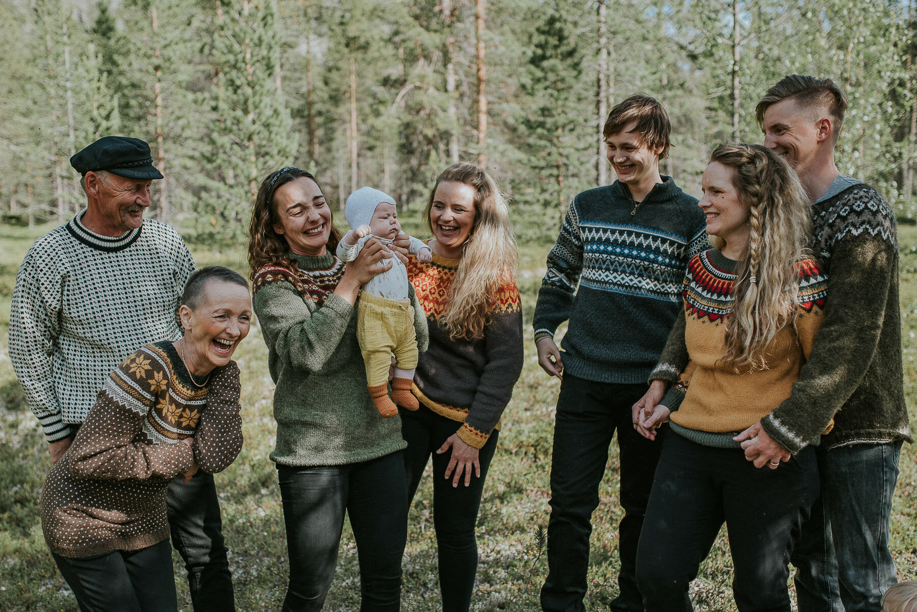 Big family having good time in the forest and laughing