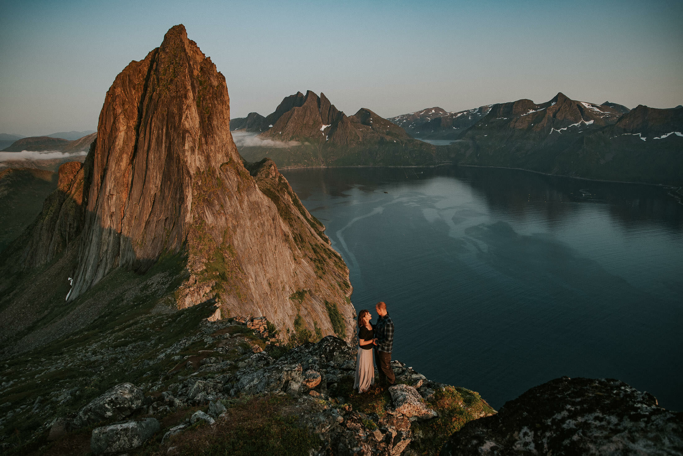 Adventurous couple session with a stunning view to Segla in Senja Norway