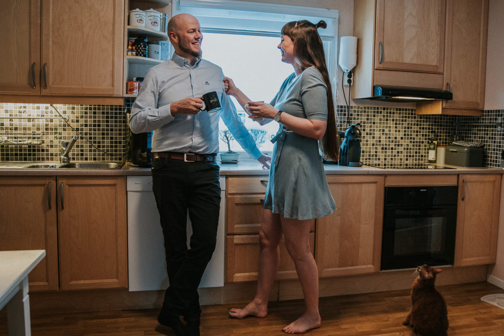 A family having a nice moment at the kitchen drinking coffee - the story of how I become a full time photographer in Norway