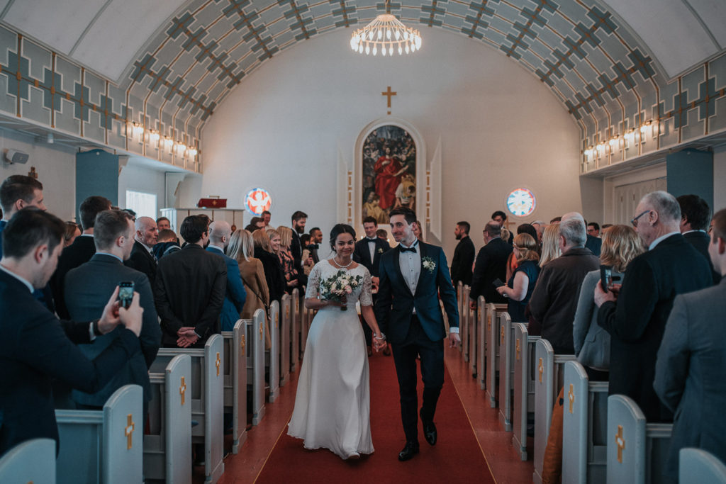 Just married walking down the aisle