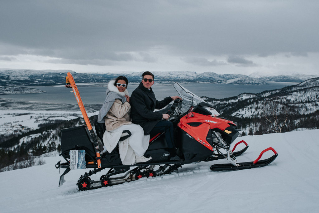 Snowmobile trip with bride and groom