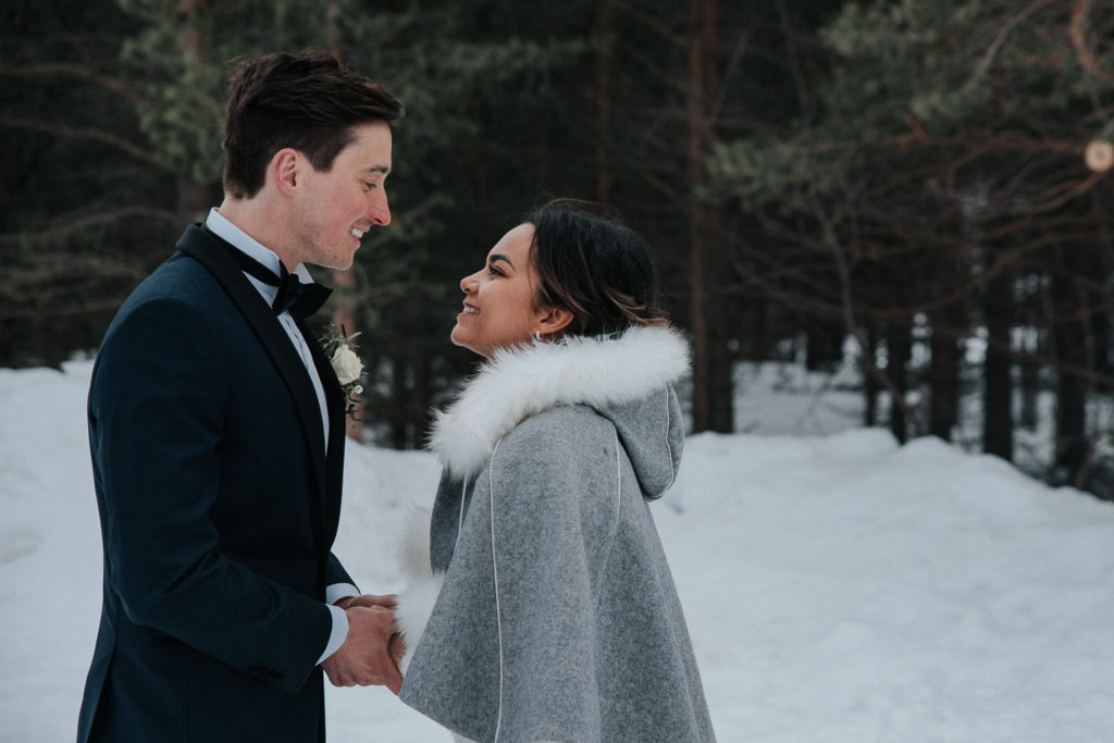 Stunning bride and groom smiling to each other