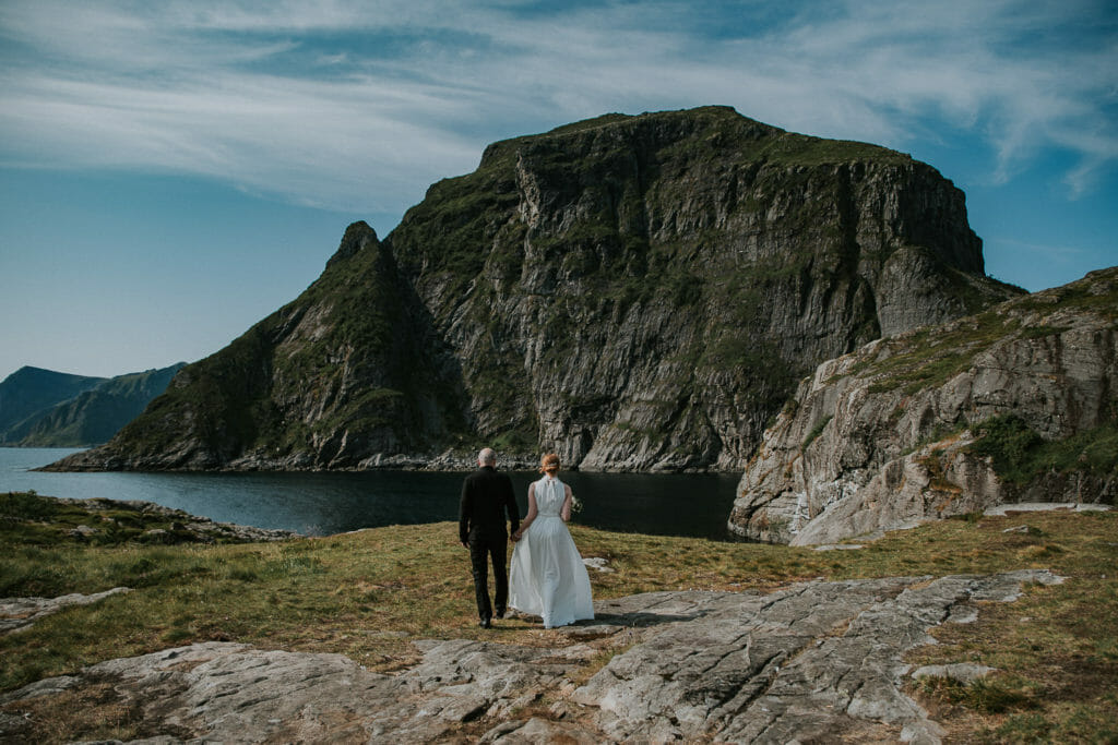 Beautiful couple getting married amoung stunning landscapes in Lofoten islands - destination wedding in Norway