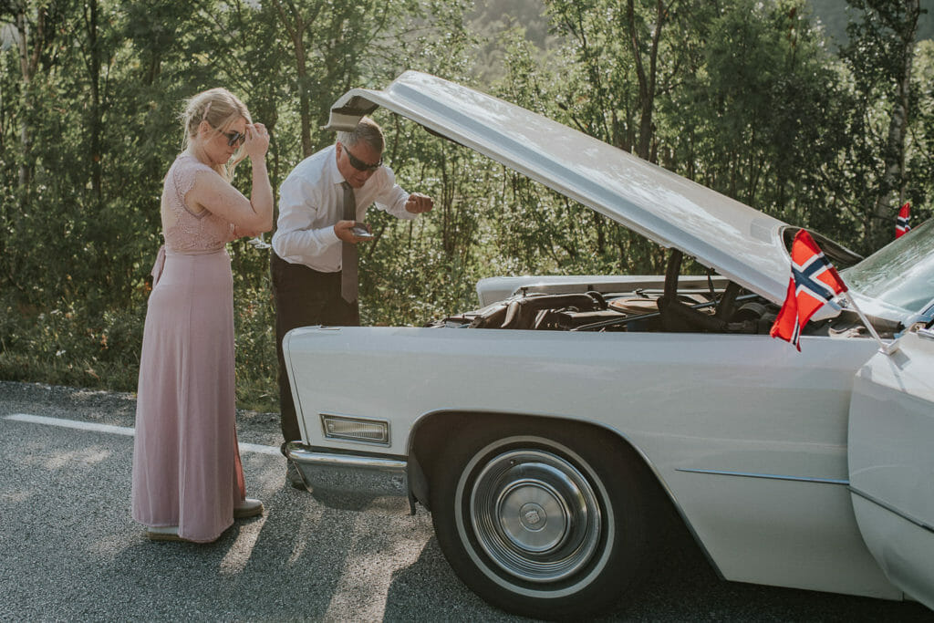 Bridal car got broken right before the party, and the driver is fixing it