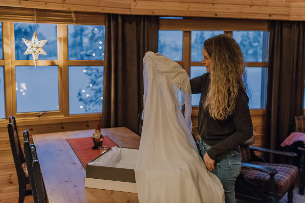 Beautiful bride is getting ready for a winter wedding in ice hotel Sorrisniva Alta Norway