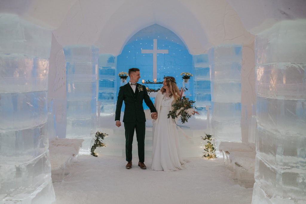 Just married in the ice and snow chapel in igloo hotel in Alta Norway