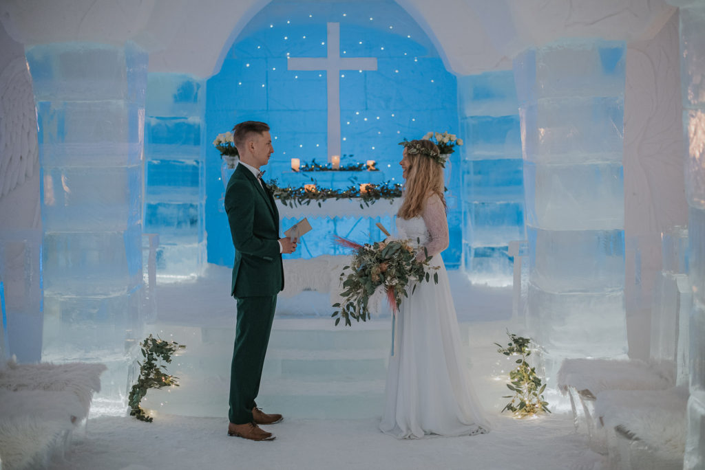 Beautiful couple eloping in ice-hotel Sorrisniva Alta Norway