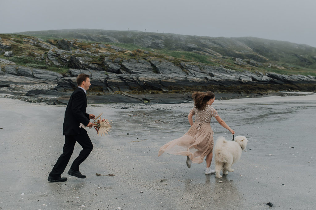 Eloping on the beach in Norway with your dog  - bride and groom made sure their elopement timeline had room for lots of fun during their special day