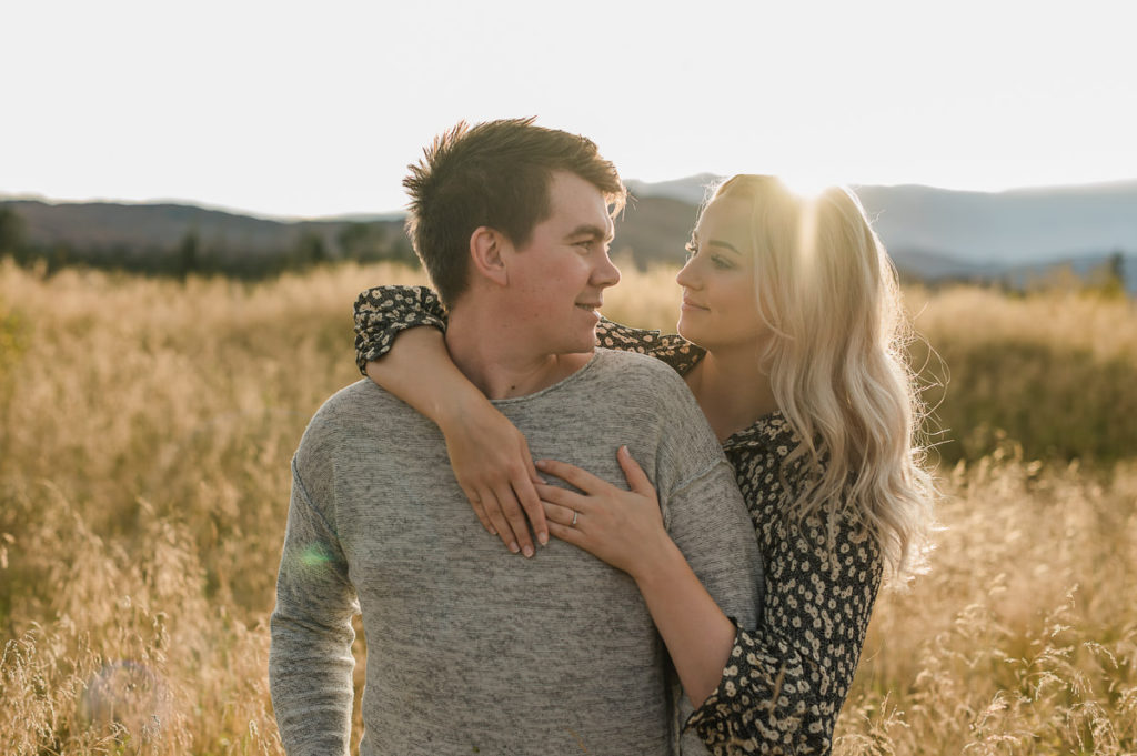 Norway engagement photo session in a beautiful sunset in golden fields in Alta