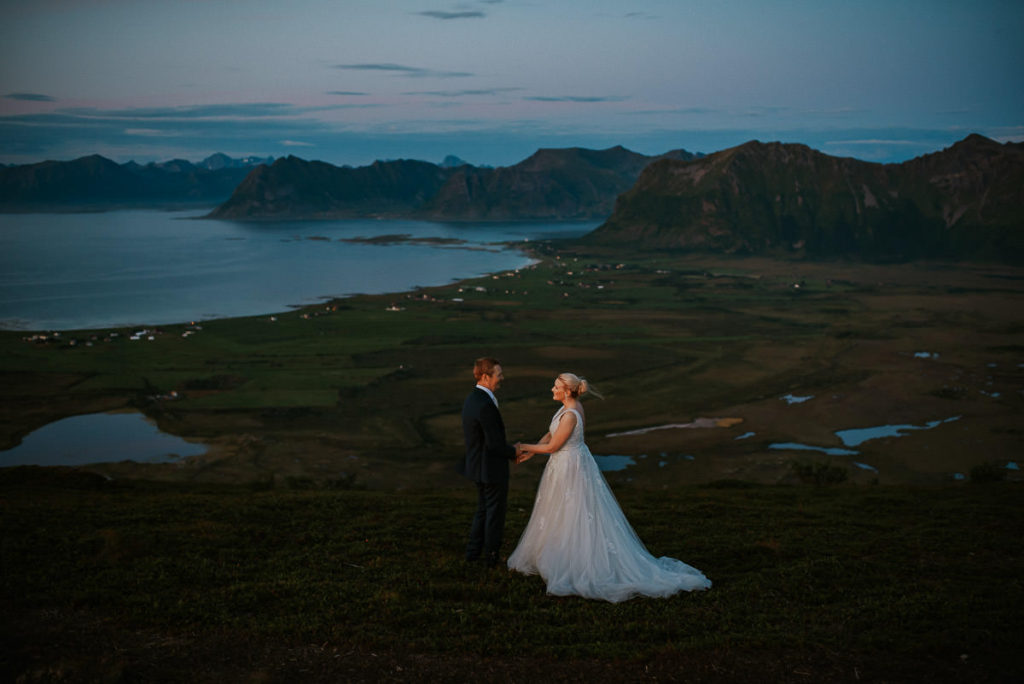 Bride and groom getting married on a mountaintop in Lofoten, Norway - adventure elopement in Lofoten