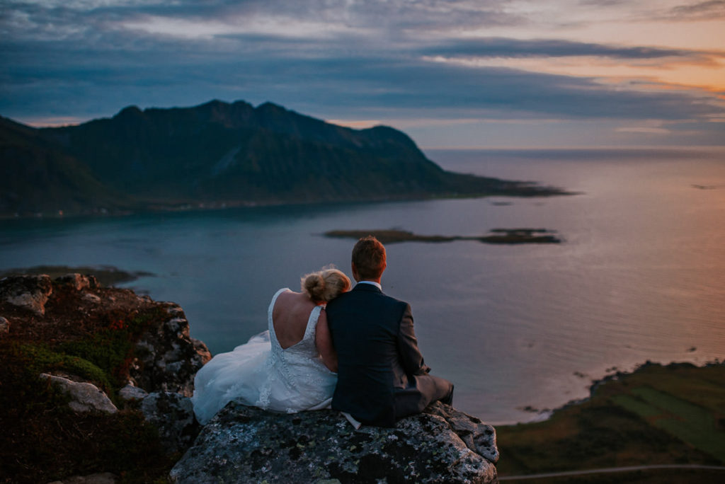 Adventure elopement wedding day in Lofoten - Norway elopement photographer captured a stunning bridal portrait in the sunset