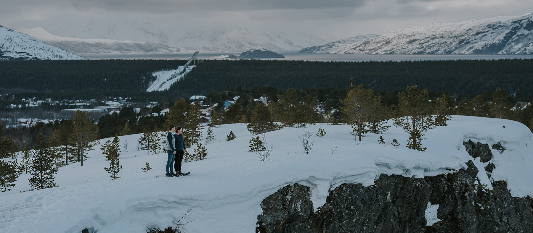 Snowshoeing engagament photo session in the hills of Alta Norway captured by Norway wedding photographer TS Foto Design