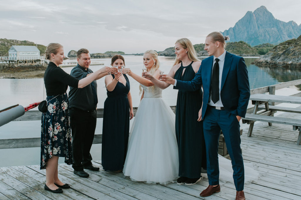 wedding party in Nyvågar rorbu hotell in Kabelvåg Lofoten. Guests are having good time and laughing all the time