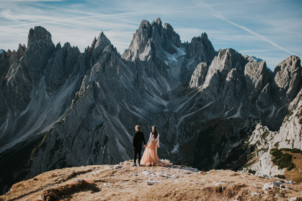 Bride and groom portrait in front of stunning Italian Dolomites - captured by Dolomites wedding photographer TS Foto Design