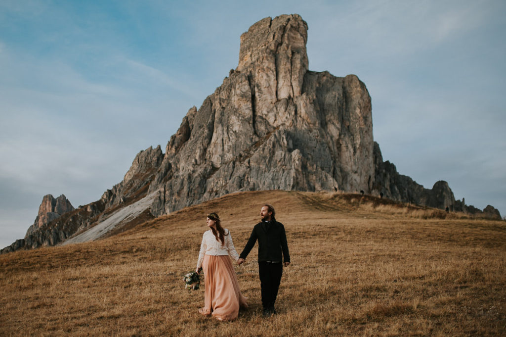 Bridal portrait in front of a beautiful rugged mountain in Italian Alps by Dolomites wedding photographer TS Foto Design