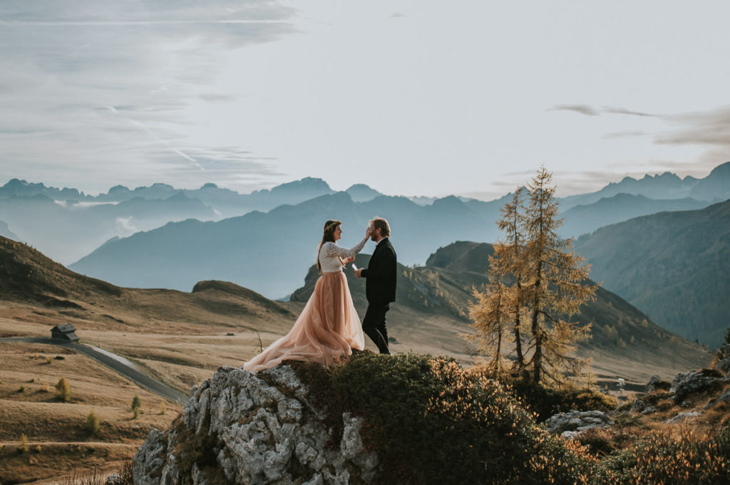 Vow renewal on the day of the wedding anniversary in a stunning location in Italian Dolomites on a sunny autumn day in Northern Italy - captured by Dolomites wedding photographer TS Foto Design 