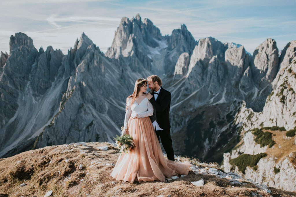 Bridal portrait with the stunning rugged Italian Dolomites in the background - captured by Dolomites wedding photographer TS Foto Design