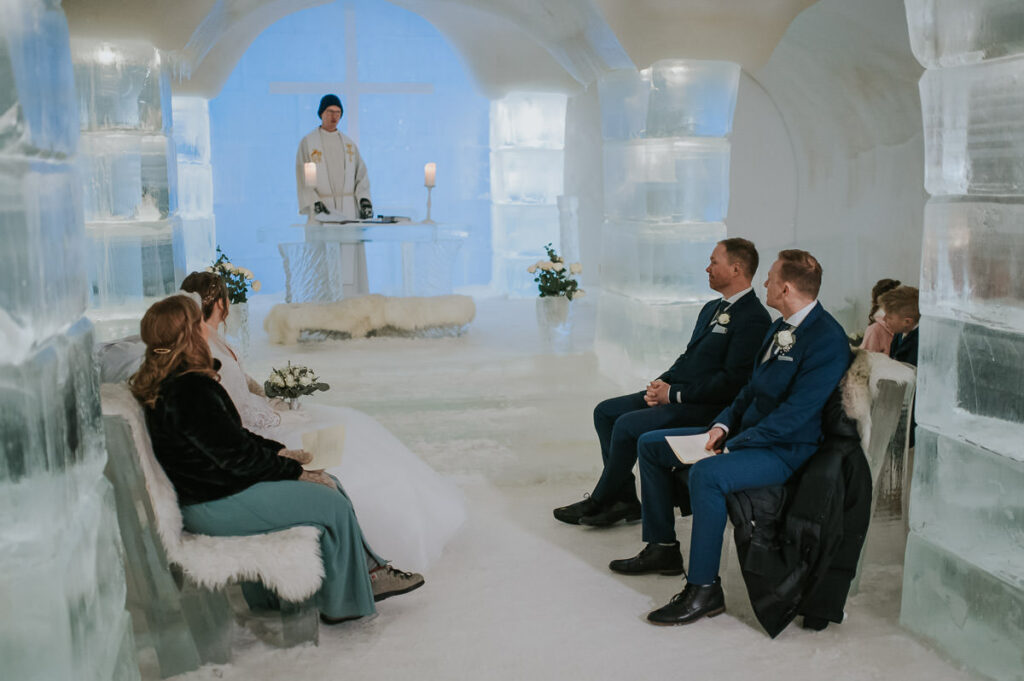 Winter wedding ceremony in the ice igloo hotel Sorrisniva in Alta Norway 