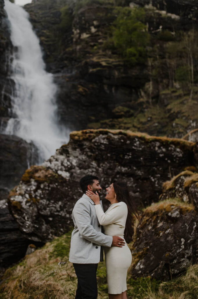 Adventure couple session by the waterfall in Norway
