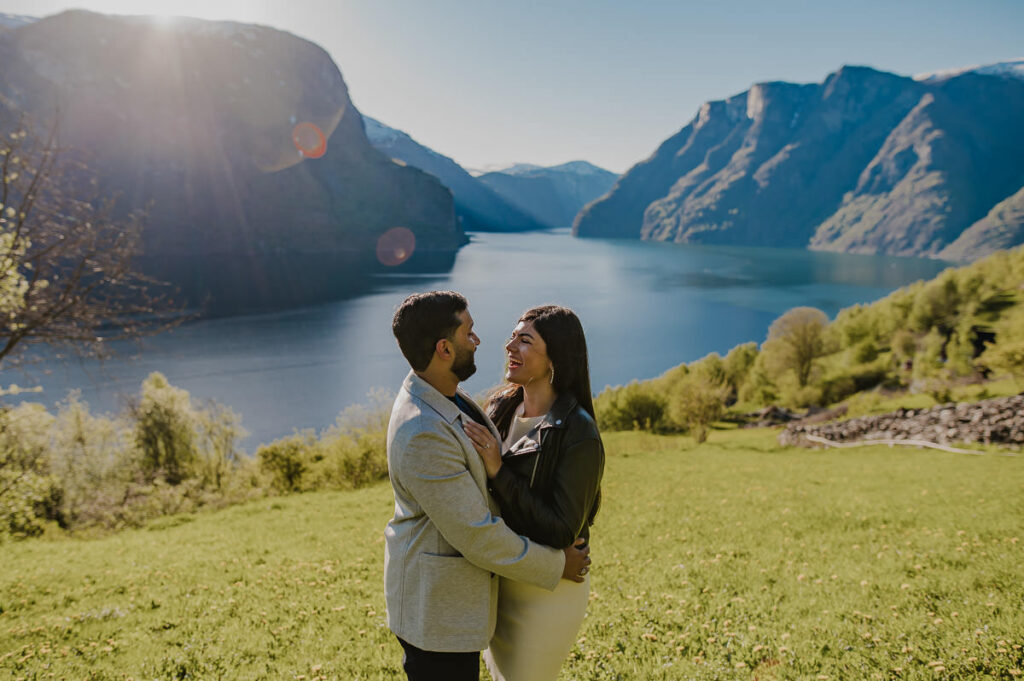 A happy couple just got engaged among beautiful scenery in Aurland, Western Norway and are now ready for their adventure engagement photo session by the fjords