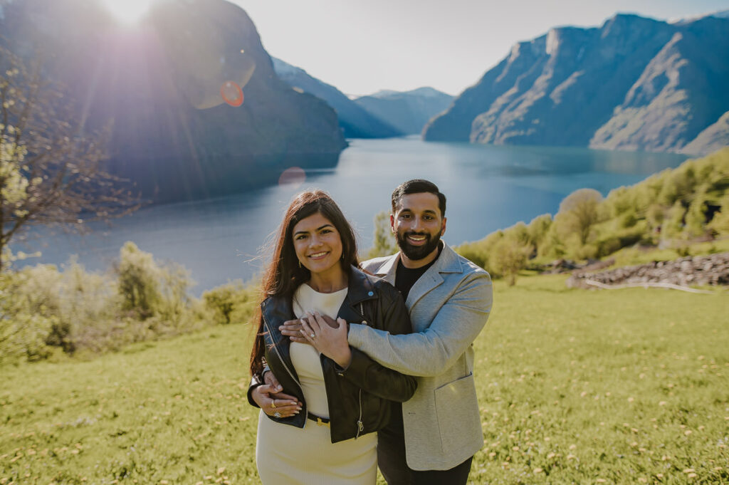 A happy couple just got engaged among beautiful scenery in Aurland, Western Norway and are now ready for their adventure engagement photo session by the fjords