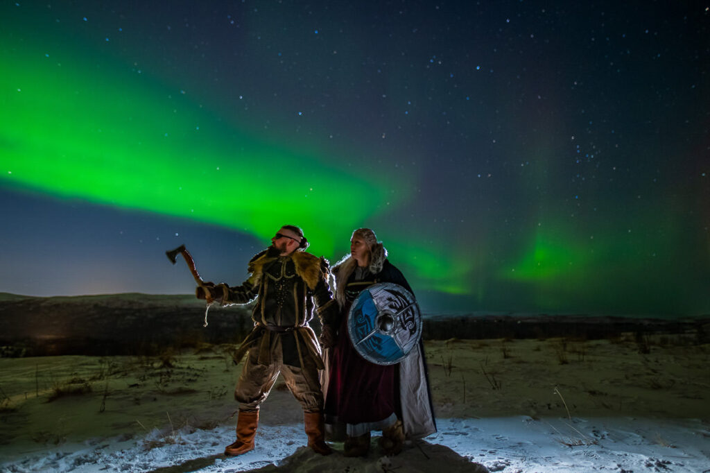 Viking style wedding photo session under the northern lights in Norway