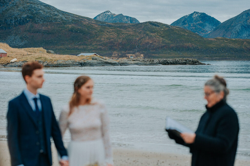 Intimate wedding ceremony on a beach near Tromsø in Norway. 