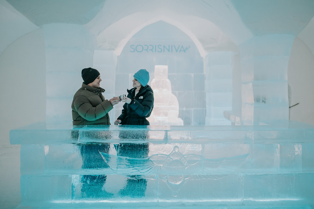 A happy couple in an ice hotel in Alta Norway