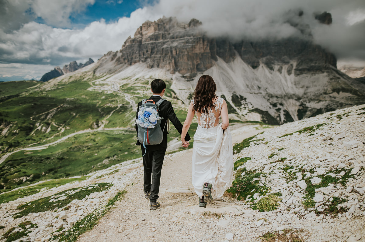 Pre-wedding photo session in the Italian Dolomites - Tre Cime di Lavaredo on a warm and sunny summer day