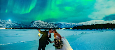 A stunning Aurora borealis wedding in Alta Norway captured by adventure elopement photographer TS Foto Design