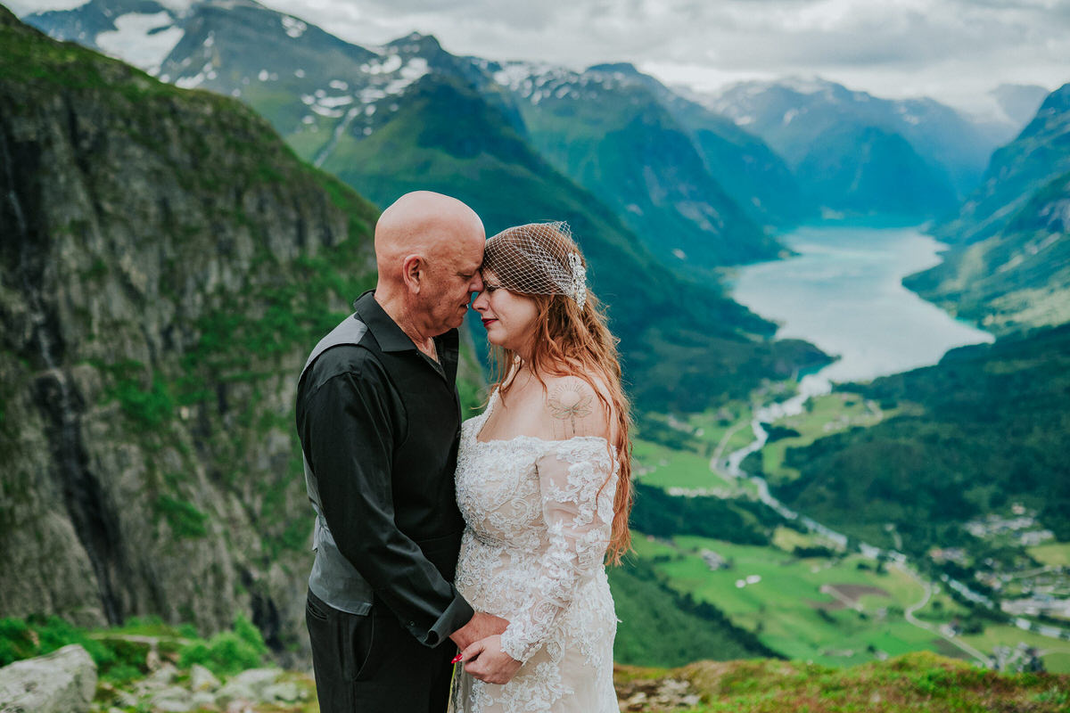 Bride and groom portrait on a mountaintop Hoven in Loen Western Norway - adventure elopement day