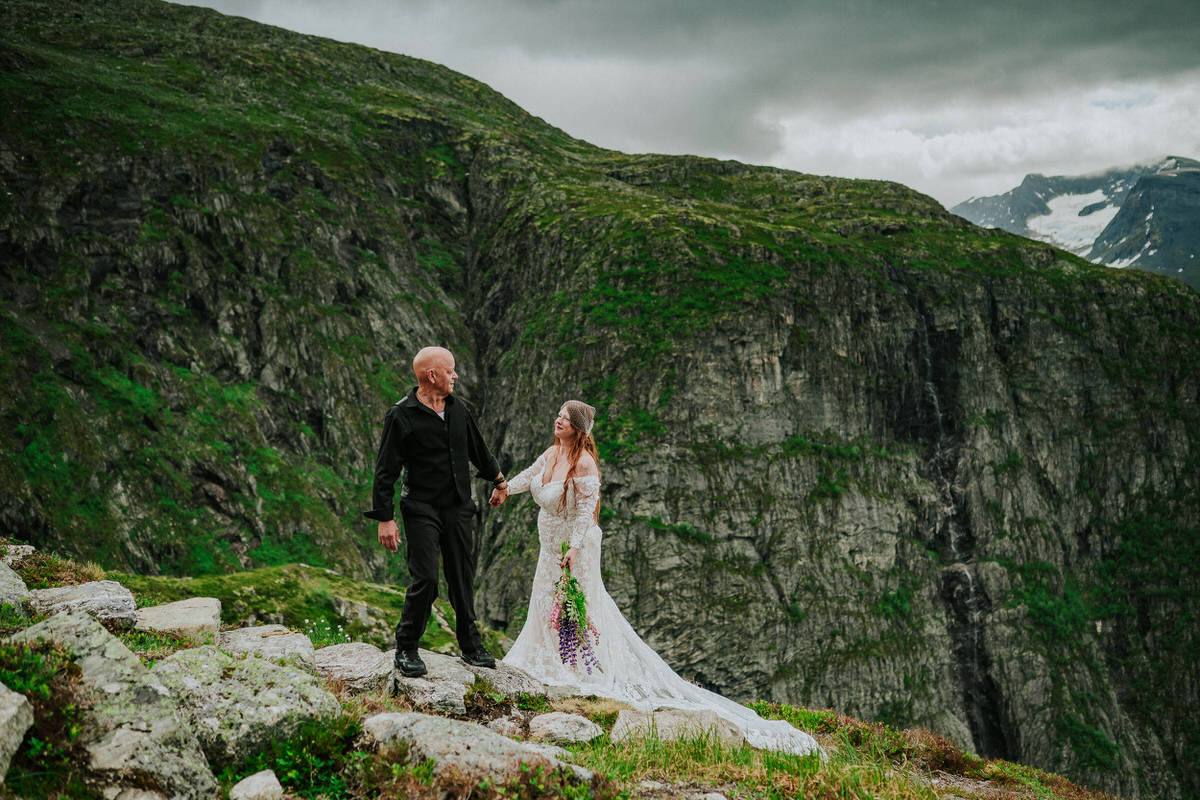 Bride and groom portrait on a mountaintop Hoven in Loen Western Norway - adventure elopement day