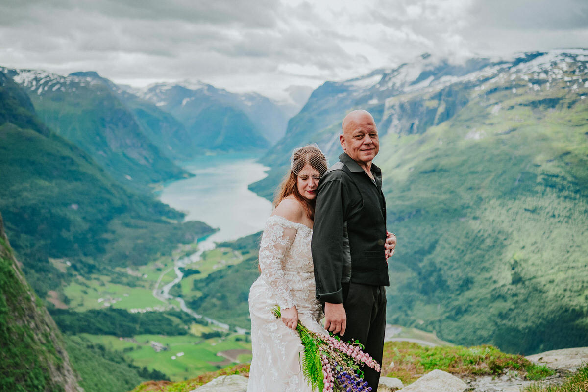 Bride and groom portrait on a mountaintop Hoven in Loen Western Norway - adventure elopement day