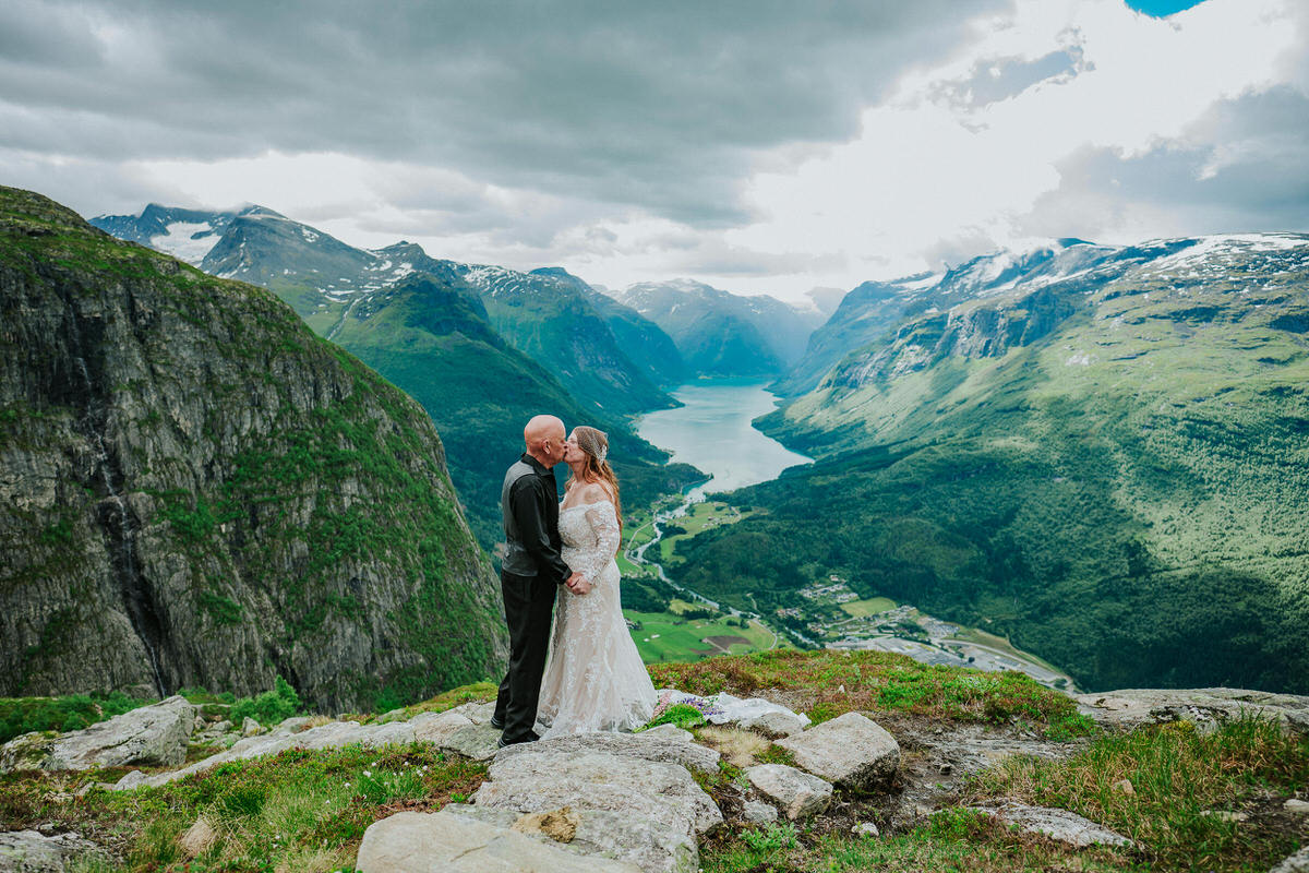 Bride and groom portrait on a mountaintop Hoven in Loen Western Norway - adventure elopement day