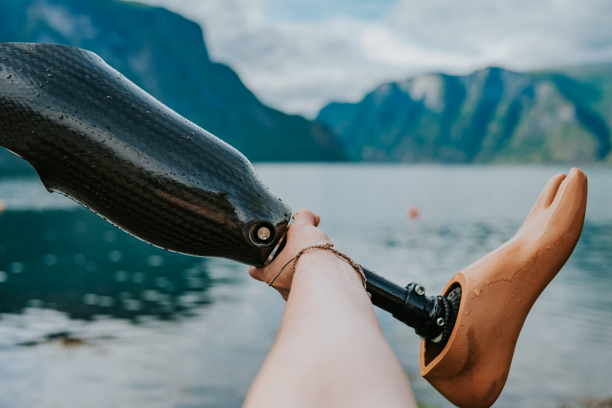 prosthetic leg in front of a fjord view in Aurland Norway