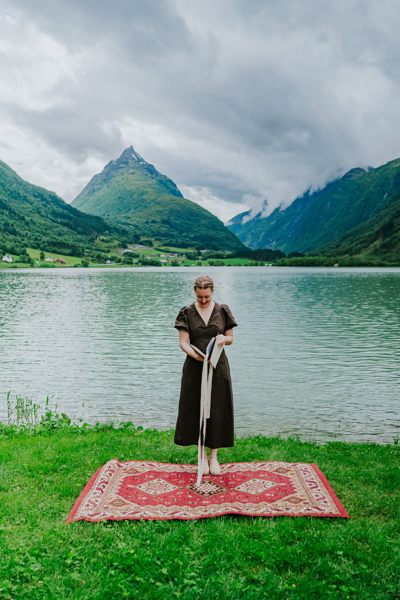 Wedding celebrant in front of Mt. Eggenipa in Western Norway
