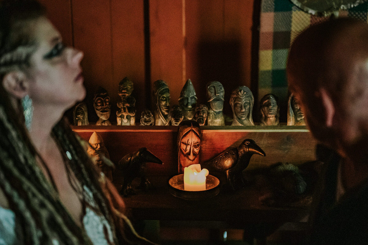 Bride and groom looking at the Odin and his ravens 